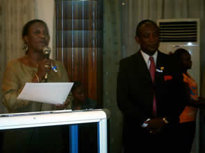 Presenter Mrs. Ettie David-Tarpeh, Minister of Labor, Youth & Spirits and honoree Dr. Eugene Musa H. Shannon